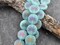 *8* 17mm Satin Matte Aqua Opaline Sliperit Laser Etched Lotus Coin Beads